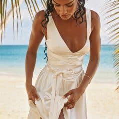 Summer beach dress in silky satin, perfect for seaside vacations and casual outings. Lightweight, stylish, and comfortable, ideal for warm weather and beachside events.