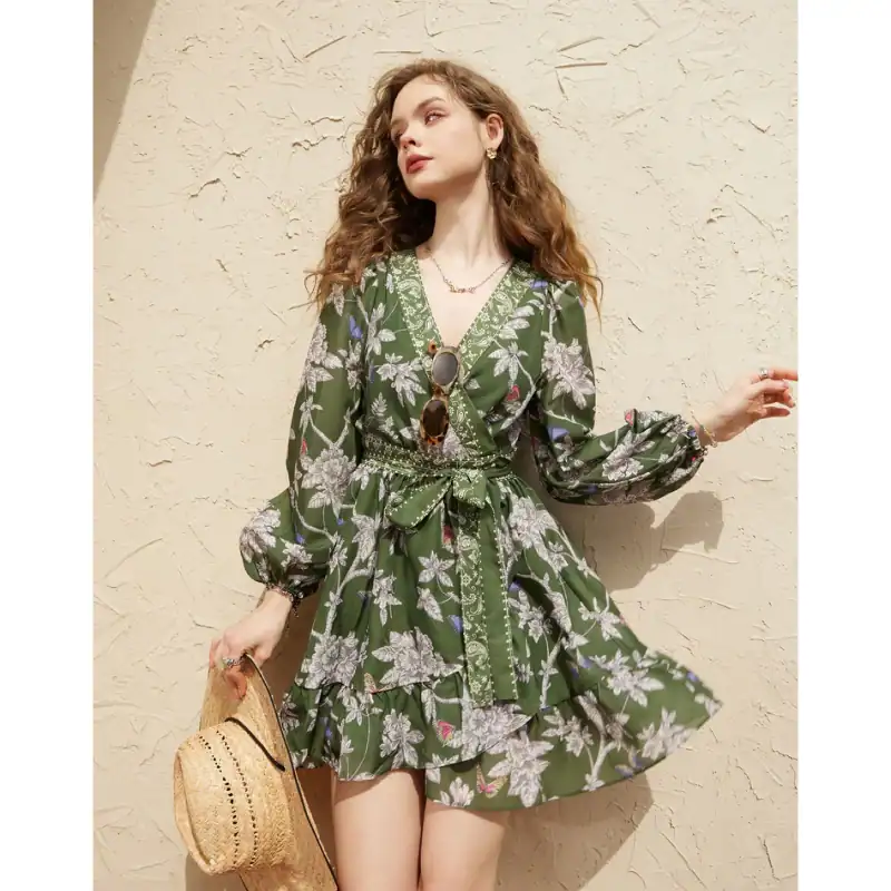 Stylish green floral dress with long sleeves, waist tie, and trendy design perfect for summer or casual outings.