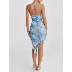 Stylish blue and white tie-dye dress with asymmetrical hem, perfect for summer or casual outings. Features a back zipper and flattering fit, ideal for women seeking trendy fashion.