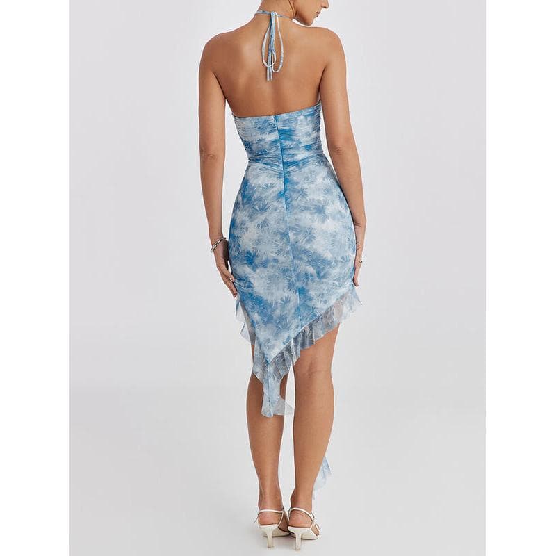 Stylish blue and white tie-dye dress with asymmetrical hem, perfect for summer or casual outings. Features a back zipper and flattering fit, ideal for women seeking trendy fashion.