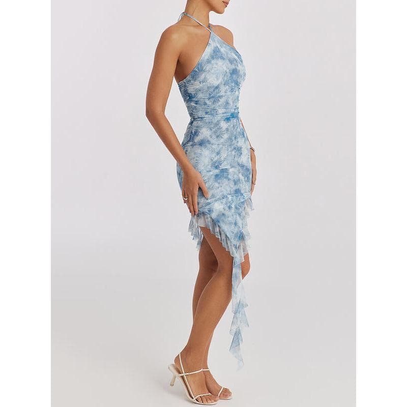 Stylish women’s blue tie-dye dress with ruffle detailing, perfect for casual or semi-formal occasions. Features a high slit and asymmetrical hemline, ensuring a chic and trendy look.