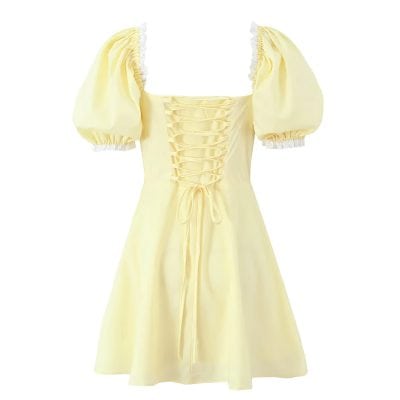 Elegant yellow dress with puff sleeves and lace-up front, perfect for stylish occasions and special events.