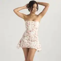 A stylish floral mini dress perfect for summer and casual outings, available at Monalisa Store. Discover trendy women's fashion with high-quality fabrics and a flattering fit.