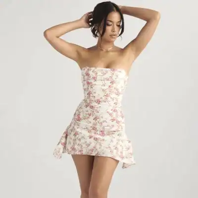 A stylish floral mini dress perfect for summer and casual outings, available at Monalisa Store. Discover trendy women's fashion with high-quality fabrics and a flattering fit.