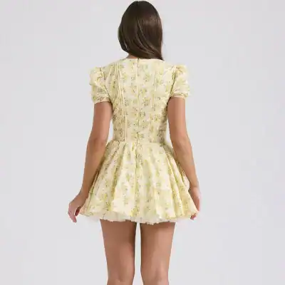 Beautiful yellow floral dress with puff sleeves, ideal for spring and summer outings, featuring a vintage-inspired silhouette, perfect for casual or semi-formal occasions.