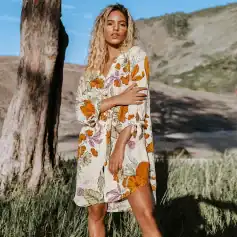 Stylish women's floral dress perfect for casual or resort wear, made from comfortable fabric with vibrant patterns, ideal for summer outings, vacations, or everyday fashion at Monalisa Store.