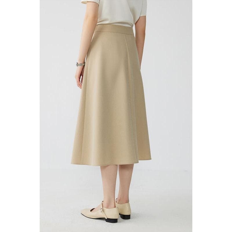 Elegant beige midi skirt for women with a flattering fit and classic style, perfect for professional or casual wear. Made from high-quality fabrics for comfort and durability.