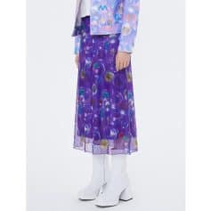 A stylish purple bubble print skirt featuring colorful, playful bubble designs perfect for fashion-forward looks. Made from lightweight, sheer fabric for comfort and flair.