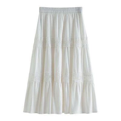 Comfortable white maxi skirt with lace details, perfect for casual or formal summer outfits. Made from lightweight, breathable fabric for easy wear and stylish appearance.