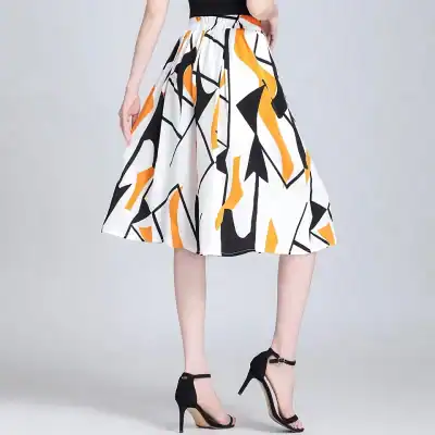 Elegant women's fashion skirt with bold black, white, and orange abstract patterns, perfect for stylish looks and versatile occasions.