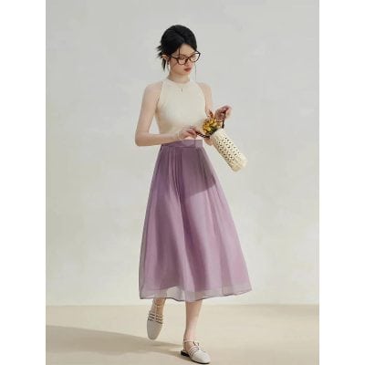A stylish women's maxi skirt in a soft purple hue, perfect for casual and formal occasions with flowing fabric and comfortable fit.