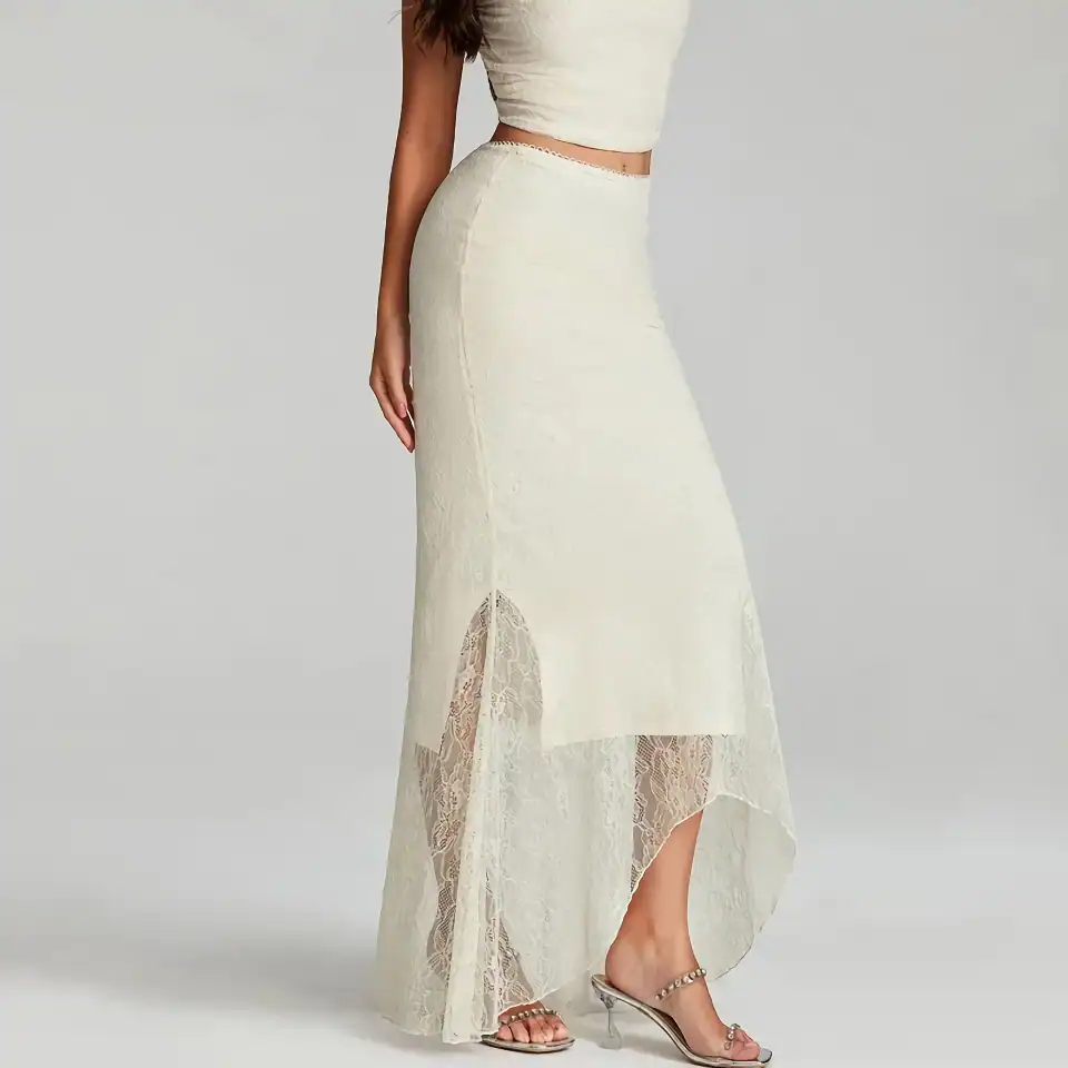 Lace maxi skirt with high slit, perfect for stylish summer outfits and special occasions. Features delicate lace details and a flowing silhouette for a chic, feminine look.
