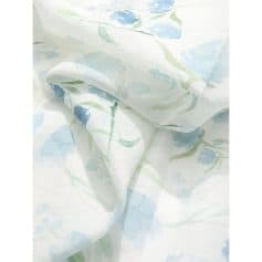 Luxurious white bedding with pastel blue and green floral patterns, perfect for a fresh, serene bedroom decor. Soft, breathable fabric for ultimate comfort.