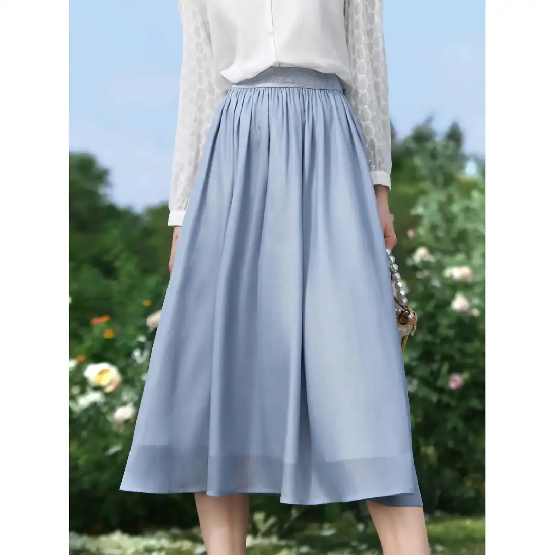High-quality, stylish wide-leg skirt in soft blue, perfect for casual or formal wear, offering comfort and a trendy look.