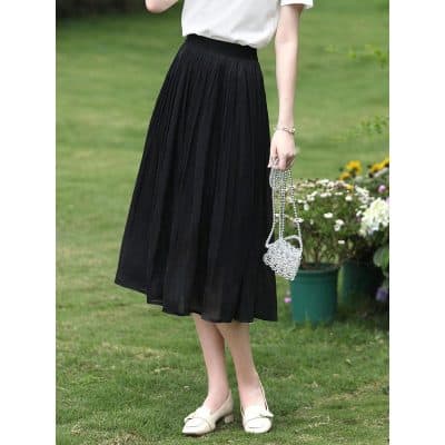 A stylish black pleated midi skirt perfect for casual and formal occasions, featuring comfortable fabric, high waist design, and versatile fashion appeal.