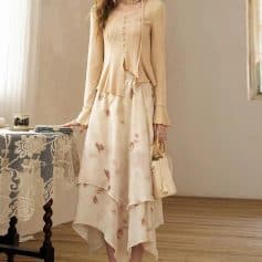 Stylish beige cardigan and flowy floral midi skirt, perfect for sophisticated looks. Ideal for women seeking comfortable yet chic outfit options at Monalisa Store.