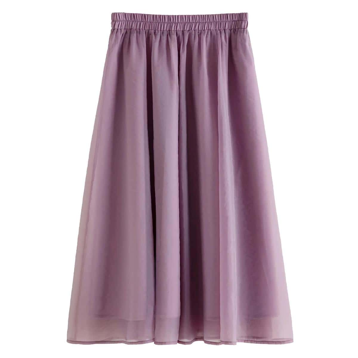 High-quality pink tulle skirt with an elastic waistband, perfect for fashion-forward women seeking stylish and comfortable clothing options. Great for casual or special occasions.