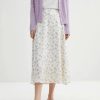 Soft, flowy floral midi skirt perfect for spring and summer outfits. Crafted with lightweight fabric featuring a delicate print, ideal for stylish, comfortable everyday wear.