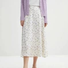 Soft, flowy floral midi skirt perfect for spring and summer outfits. Crafted with lightweight fabric featuring a delicate print, ideal for stylish, comfortable everyday wear.