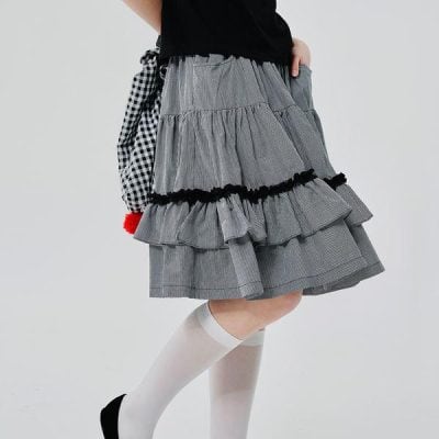 Stylish grey checked ruffled skirt for women, casual fashion, trendy apparel accessories.
