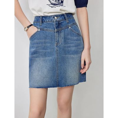Stylish blue denim skirt with a high waist and frayed hem, perfect for casual or chic outfits.