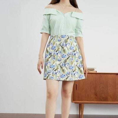Elegant women’s floral skirt and pastel top for modern fashion, perfect for casual and professional wear.