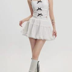 Elegant white ruffle skirt with tiered design, perfect for stylish fashion and versatile occasions. Comfortable, trendy, and ideal for casual wear or dress-up styling.