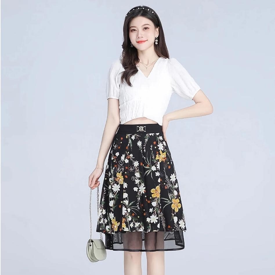 Stylish floral midi skirt with black background, yellow and white flower print, perfect for casual or office wear, from Monalisa Medical Store.