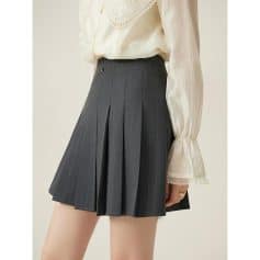 Stylish high-waisted pinstripe pleated skirt perfect for office or casual wear. Comfortable fit, elegant design, and versatile for various outfits. Shop now for a chic look!.