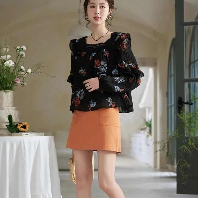 Elegant floral blouse and stylish orange skirt for women at Monalisa Medical Store.