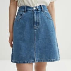 Comfortable high-waisted blue denim skirt for women, perfect for casual and stylish everyday wear. Features classic pockets and trendy A-line design.