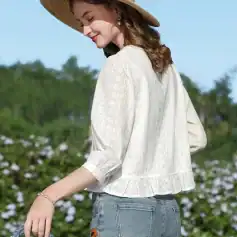 Elegant wide-brim straw hat perfect for sunny outdoor activities and garden use.