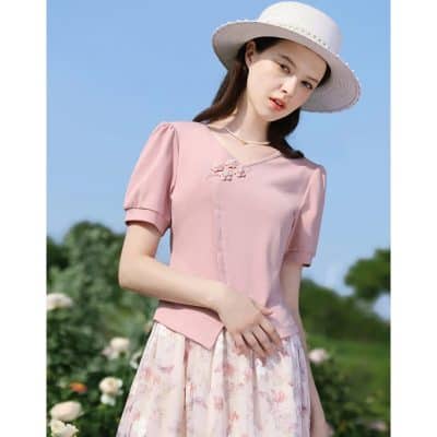Stylish pink blouse with floral embellishments for women, perfect for summer and outdoor events, from Monalisa Medical Store.