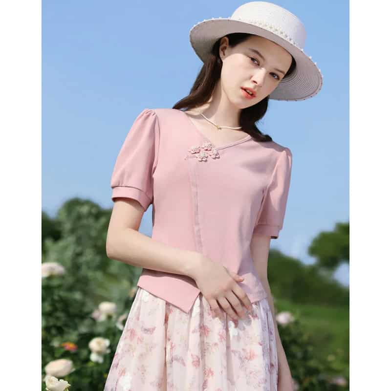 Stylish pink blouse with floral embellishments for women, perfect for summer and outdoor events, from Monalisa Medical Store.