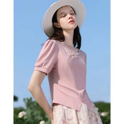 Stylish summer outfit with pink top and floral skirt, perfect for sunny days, from Monalisa Medical.