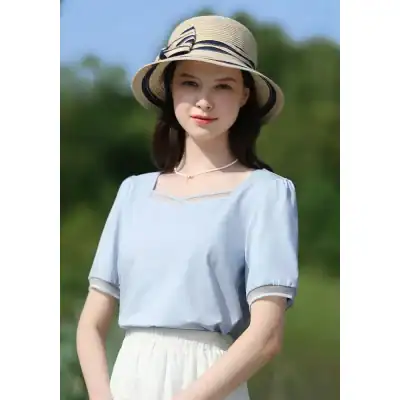 Elegant women's sun hat with wide brim, perfect for outdoor protection and fashion, ideal for beach, garden, and casual wear from Monalisa Medical Store.