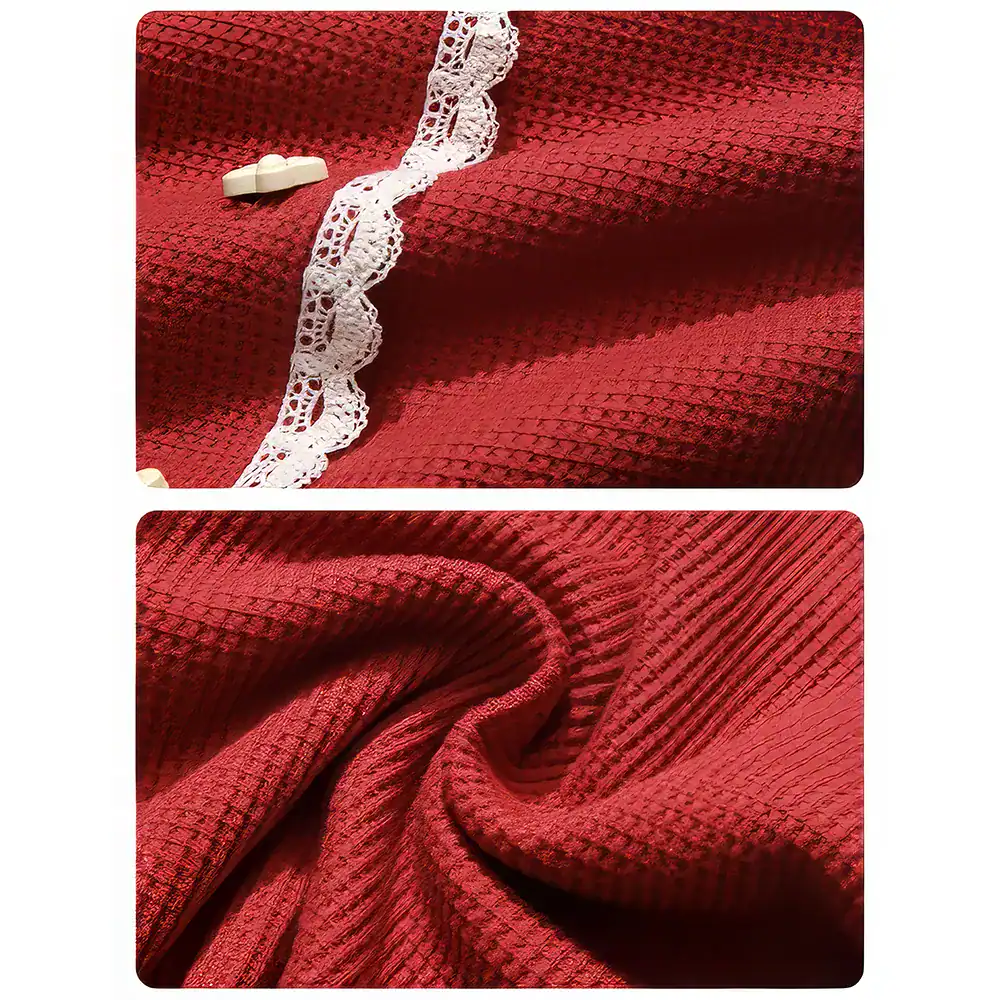 Close-up of rich red textured fabric with subtle pattern, perfect for fashion and home decor. High-quality material showcasing detailed weave and plush surface.