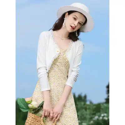 Beautiful woman wearing stylish sunglasses, summer hat, and fashionable outfit, showcasing trendy eyewear accessories from Monalisa Medical Store for optical needs.