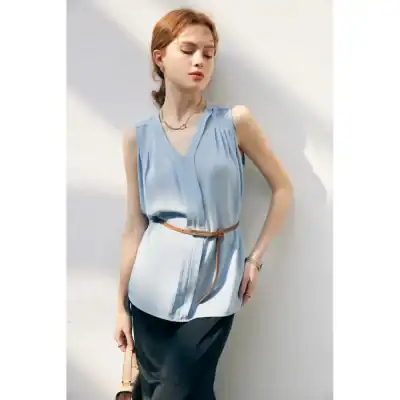 Stylish blue sleeveless blouse perfect for fashion-forward women seeking quality optical and eyewear accessories from Monalisa Store.
