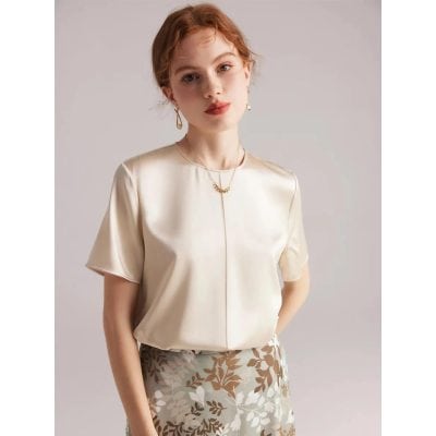 Luxurious beige satin blouse for women, perfect for formal or casual occasions, featuring a sleek design and comfortable fit.