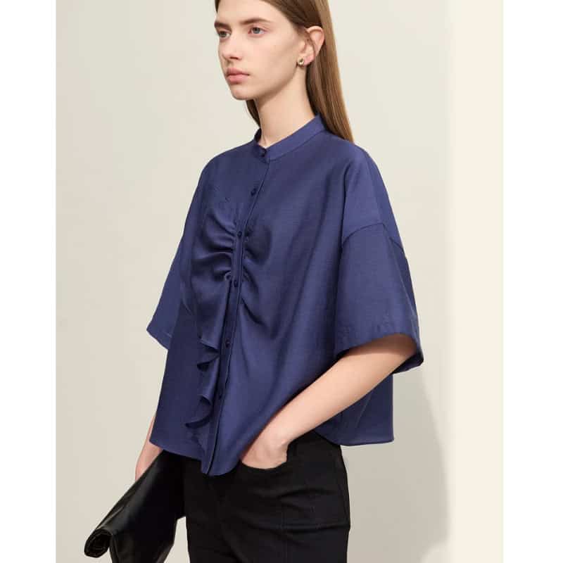 Stylish women's navy blue blouse with a ruffle front and relaxed fit, perfect for office or casual wear. Made from high-quality fabric for comfort and durability.