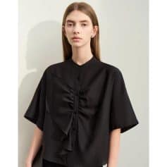 Elegant black women’s blouse with ruffled front detail, stylish and comfortable, perfect for professional or casual wear.