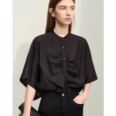 High-quality black women's blouse with a trendy design, button-up front, and comfortable fit, perfect for office or casual wear.