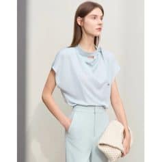 An elegant light blue women's blouse with a stylish draped neckline, perfect for business or casual wear, showcased at Monalisa Store for a chic and modern look.