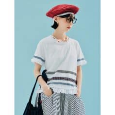 Fashionable woman wearing trendy glasses, stylish casual outfit, and accessories at Monalisa Store, perfect for eye care and optical needs.