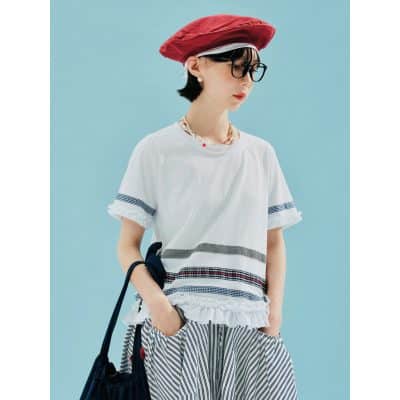 Fashionable woman wearing trendy glasses, stylish casual outfit, and accessories at Monalisa Store, perfect for eye care and optical needs.