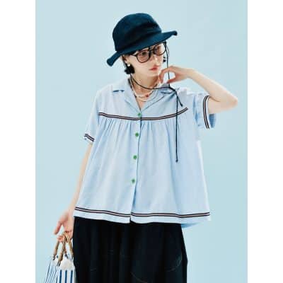 Elegant women's sunglasses paired with stylish outfit, trendy accessories, and fashionable hat, perfect for shopping and outdoor activities.