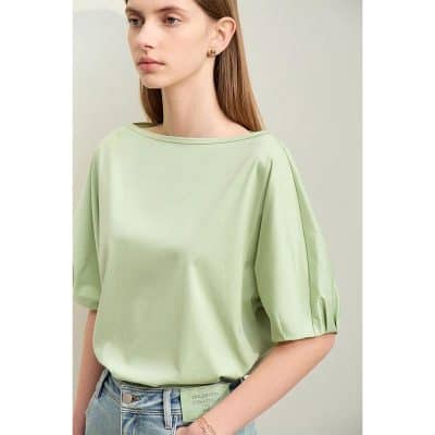 Bright lime green casual top with puffed sleeves, round neckline, and comfortable fit, ideal for everyday wear or stylish outings. Perfect for adding a pop of color to your wardrobe.
