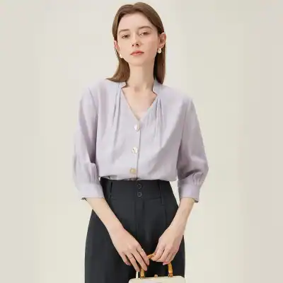 Women’s fashion blouse with buttons, perfect for chic casual or office wear at Monalisa Medical.