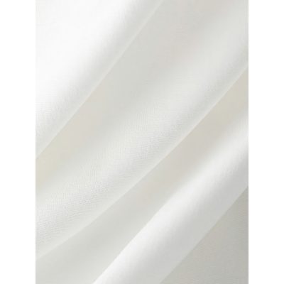 Close-up of white medical curtain fabric, showing smooth texture, ideal for healthcare settings and medical offices.